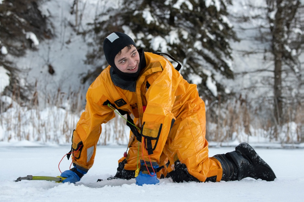 JBER fire protection specialists conduct ice rescue training