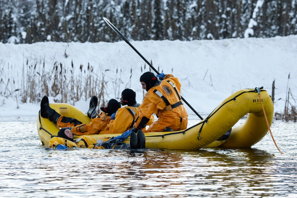 JBER fire protection specialists conduct ice rescue training