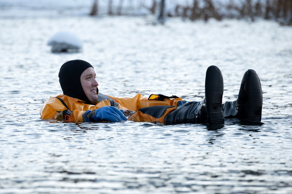 JBER fire protection specialists conduct ice rescue training