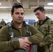 Air Force tactical air control party specialists and combat weather airmen prepare for airborne operations at JBER