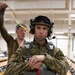 Air Force tactical air control party specialists and combat weather airmen prepare for airborne operations at JBER