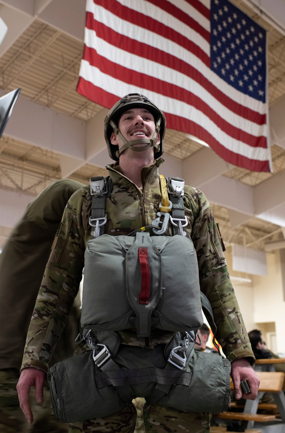 Air Force tactical air control party specialists and combat weather airmen prepare for airborne operations at JBER