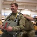 Air Force tactical air control party specialists and combat weather airmen prepare for airborne operations at JBER