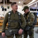 Air Force tactical air control party specialists and combat weather airmen prepare for airborne operations at JBER