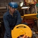 Sailor Cuts Steel Pipe