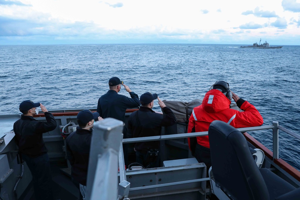 USS Ross and USS San Jacinto render passing honors