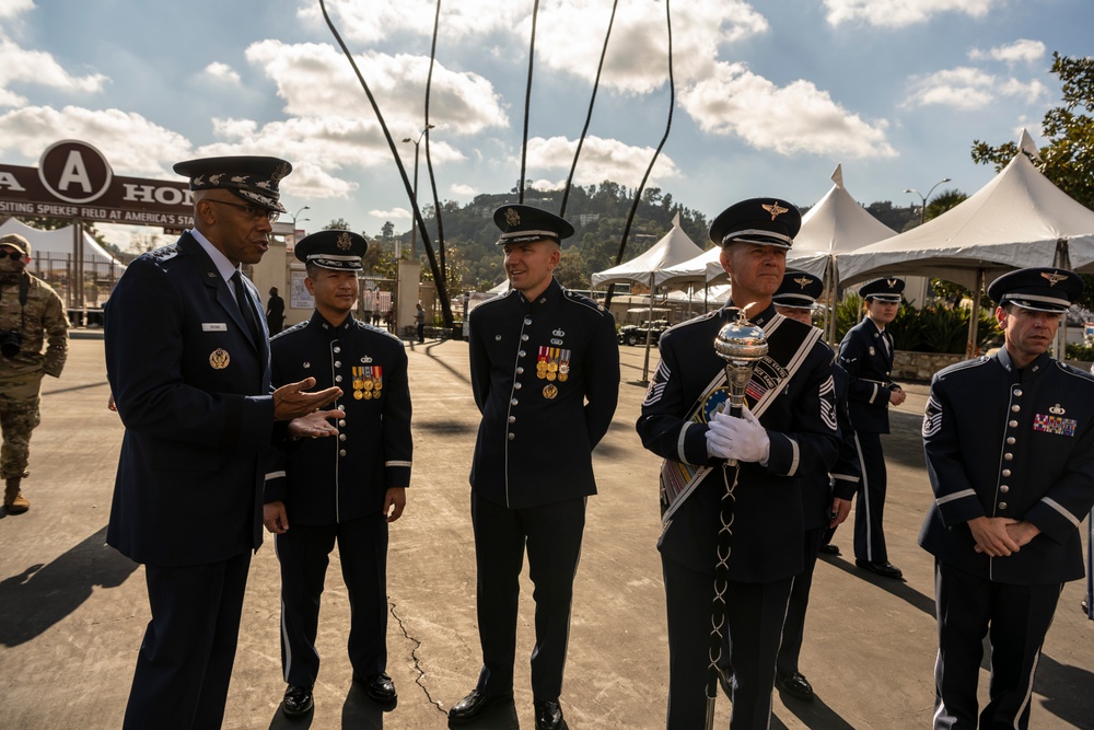 USAF Total Force Band takes photos with CSAF Gen. Brown prior to Tournament of Roses Parade