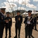 USAF Total Force Band takes photos with CSAF Gen. Brown prior to Tournament of Roses Parade