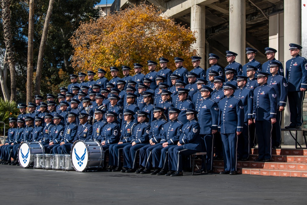 USAF Total Force Band takes photos with CSAF Gen. Brown prior to Tournament of Roses Parade