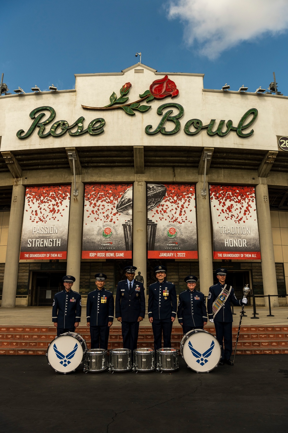 USAF Total Force Band takes photos with CSAF Gen. Brown prior to Tournament of Roses Parade