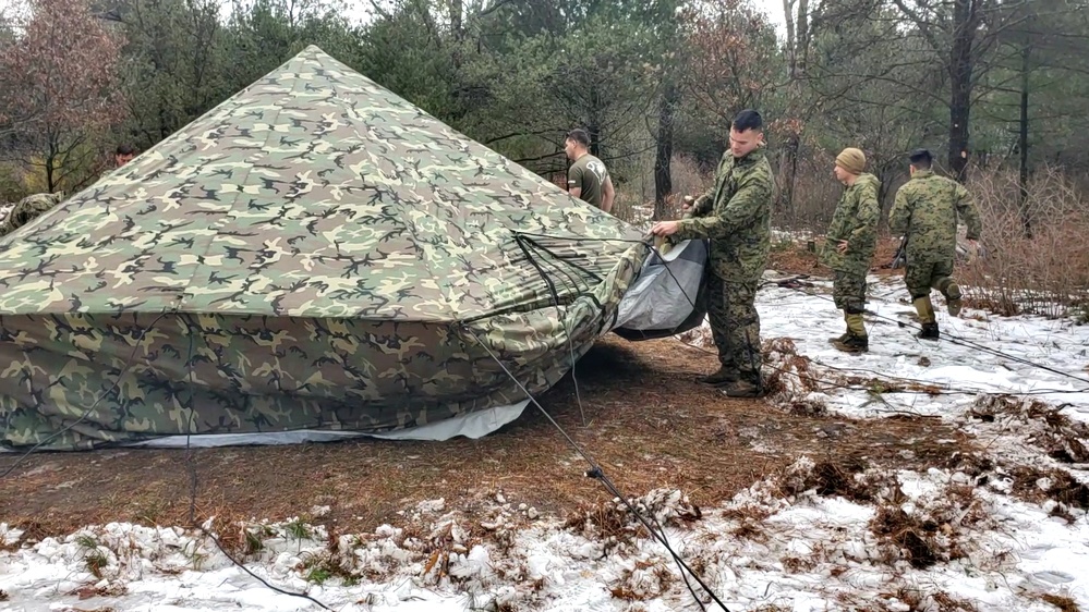 Marines practice building Arctic tent as part of CWOC Class 22-01 training