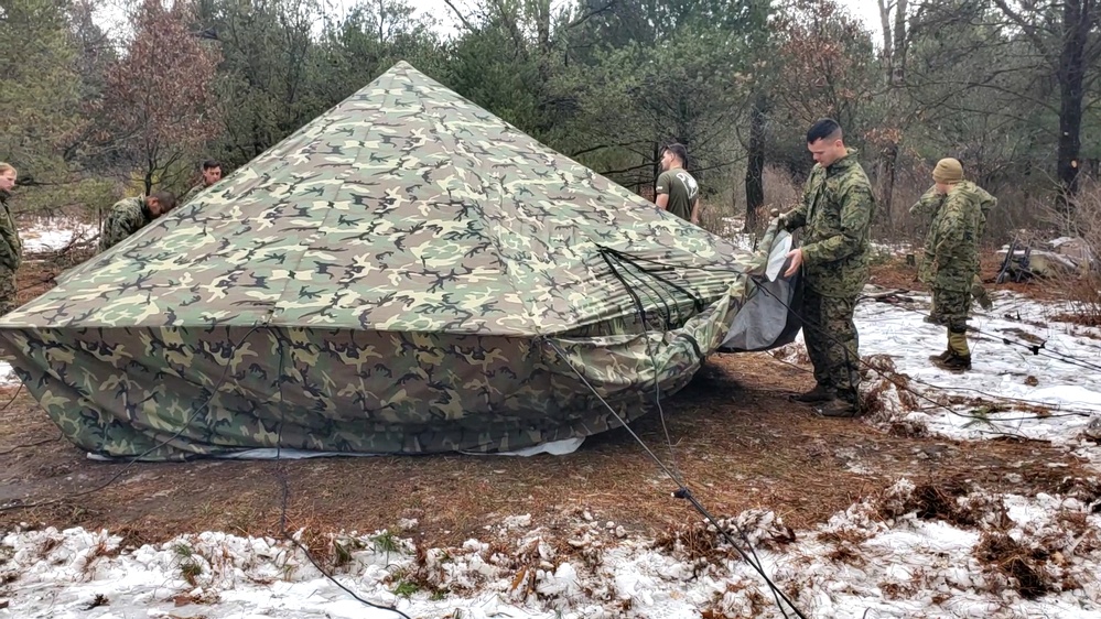 Marines practice building Arctic tent as part of CWOC Class 22-01 training