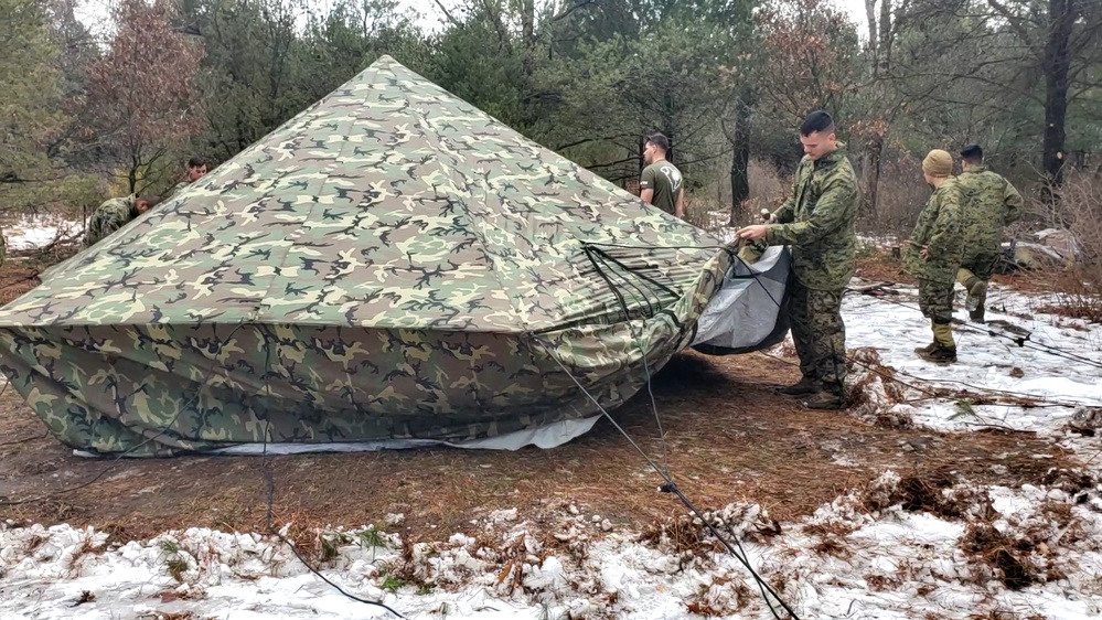 Marines practice building Arctic tent as part of CWOC Class 22-01 training