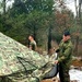 Marines practice building Arctic tent as part of CWOC Class 22-01 training