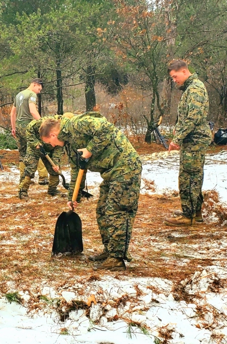 Marines practice building Arctic tent as part of CWOC Class 22-01 training
