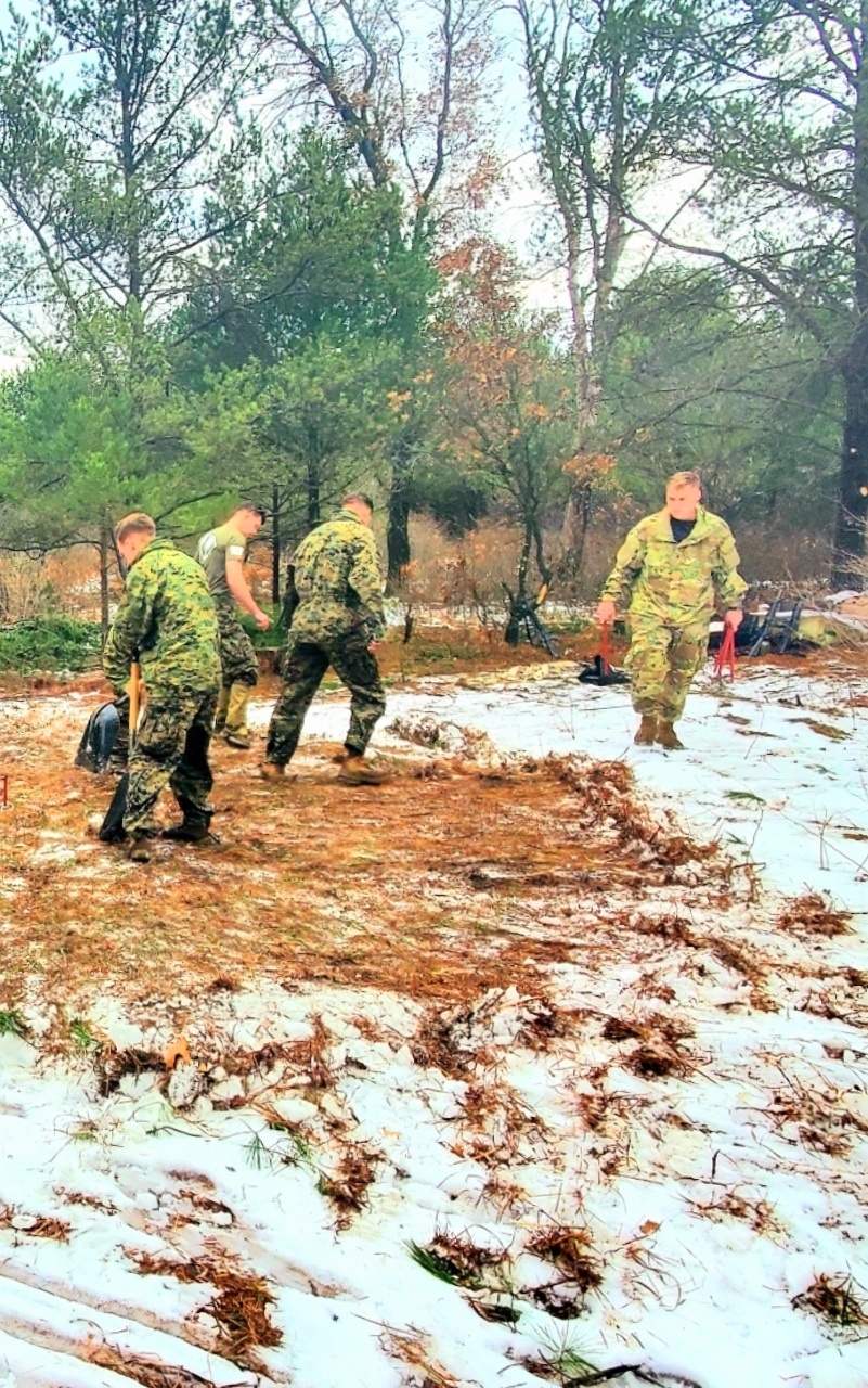Marines practice building Arctic tent as part of CWOC Class 22-01 training