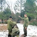 Marines practice building Arctic tent as part of CWOC Class 22-01 training