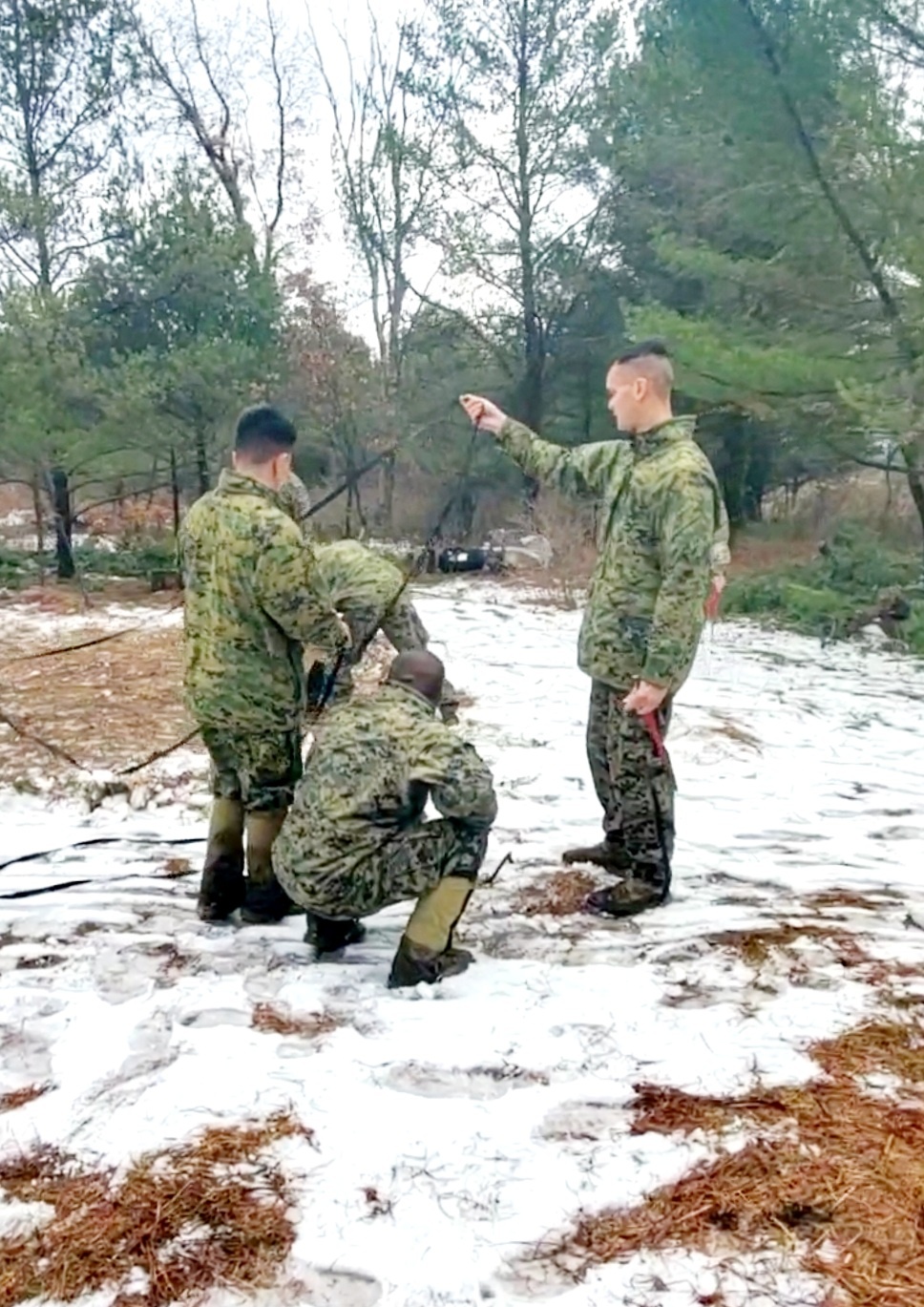 Marines practice building Arctic tent as part of CWOC Class 22-01 training