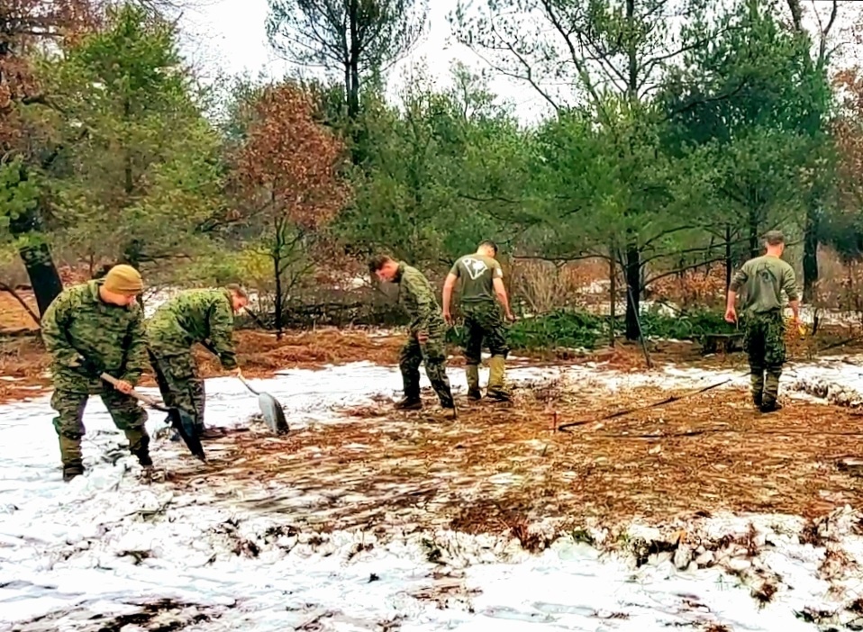 Marines practice building Arctic tent as part of CWOC Class 22-01 training