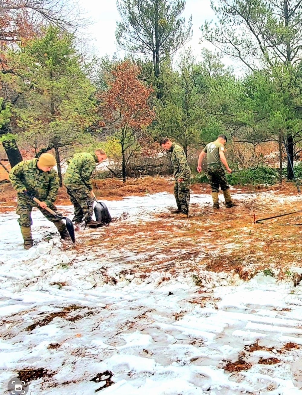 Marines practice building Arctic tent as part of CWOC Class 22-01 training