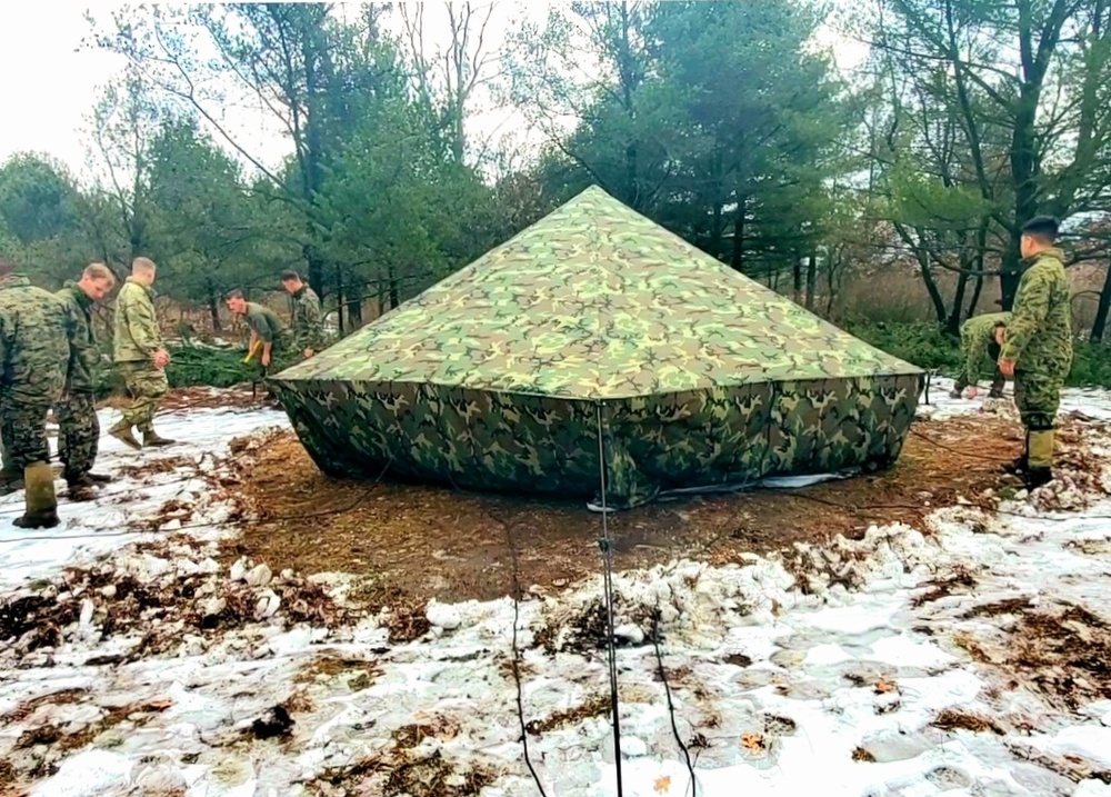 Marines practice building Arctic tent as part of CWOC Class 22-01 training