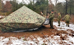 Marines practice building Arctic tent as part of CWOC Class 22-01 training