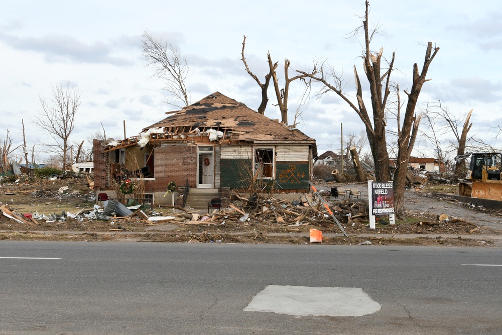 Neighborhoods Are Scattered With Debris and Houses Damaged in the Recent Tornadoes
