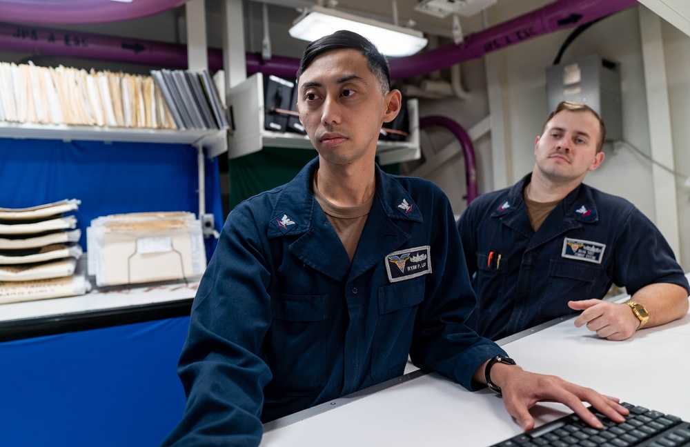 USS Carl Vinson (CVN 70) Sailors Review Maintenance Schedule