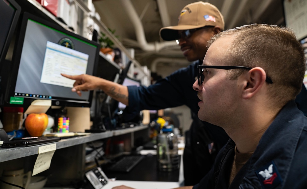 USS Carl Vinson (CVN 70) Sailors Review Maintenance Schedule