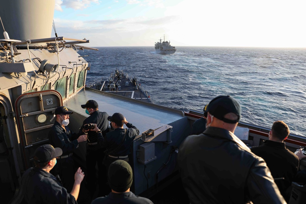 USS Ross replenishes at sea with USNS Supply