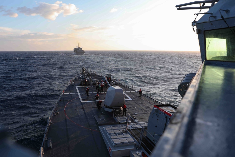 USS Ross replenishes at sea with USNS Supply