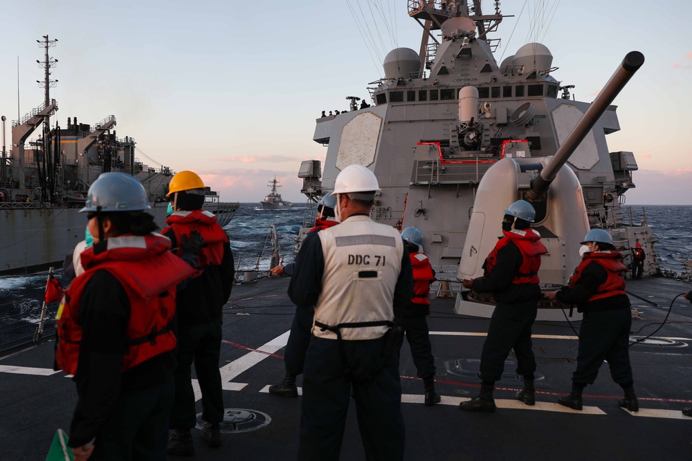 USS Ross replenishes at sea with USNS Supply