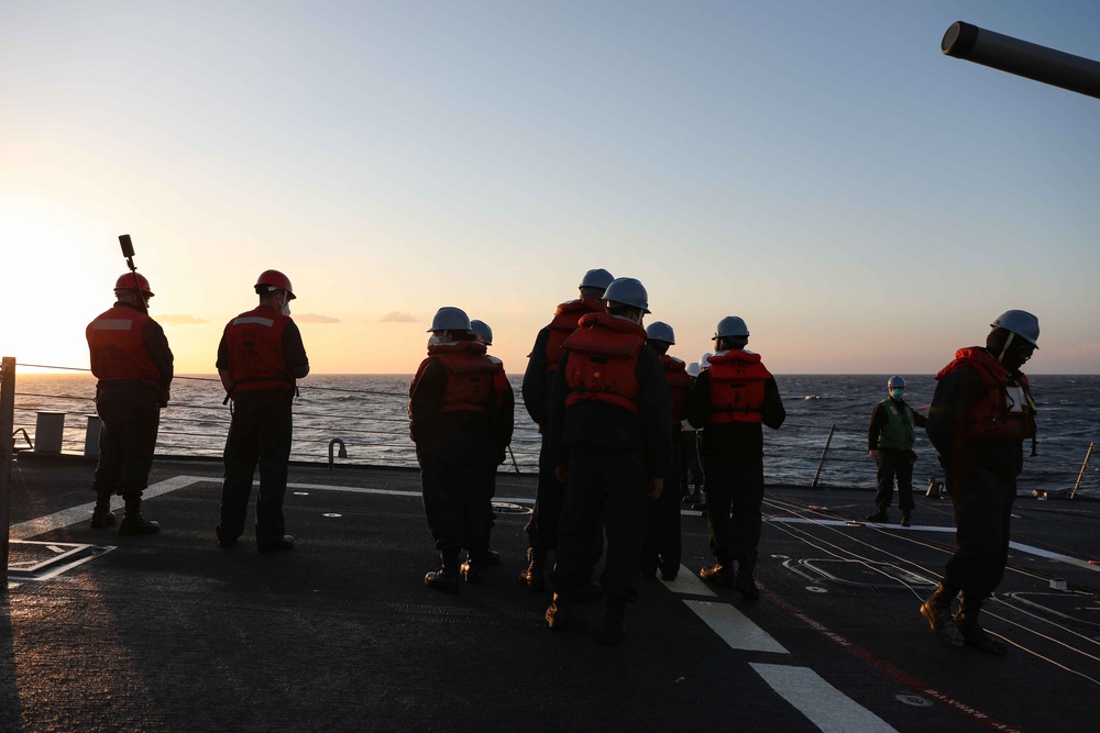 USS Ross replenishes at sea with USNS Supply