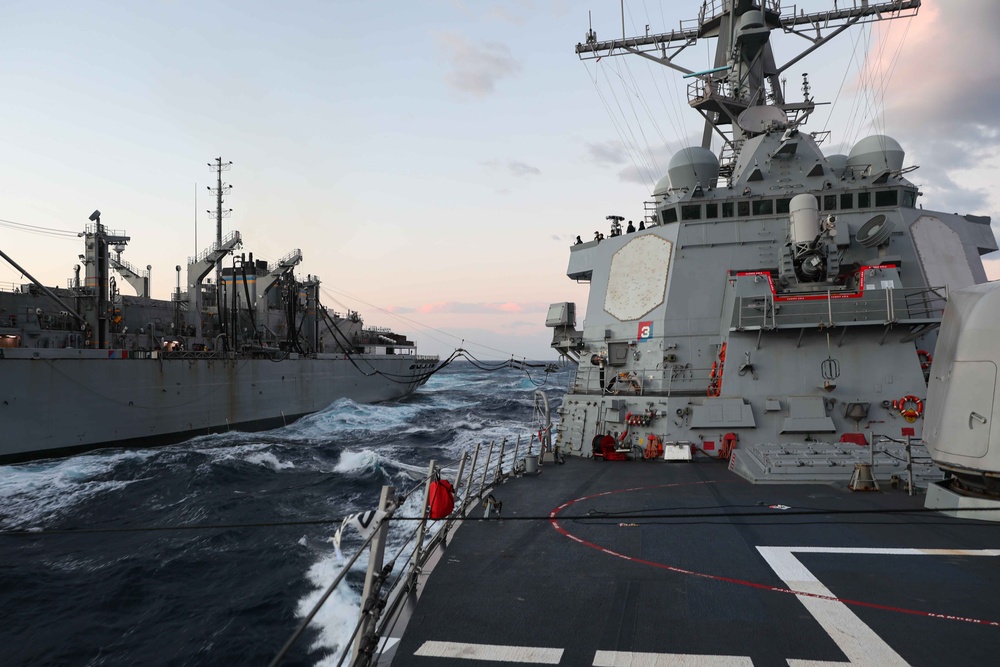 USS Ross replenishes at sea with USNS Supply