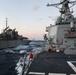 USS Ross replenishes at sea with USNS Supply