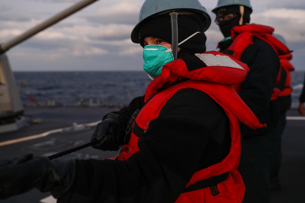 USS Ross replenishes at sea with USNS Supply