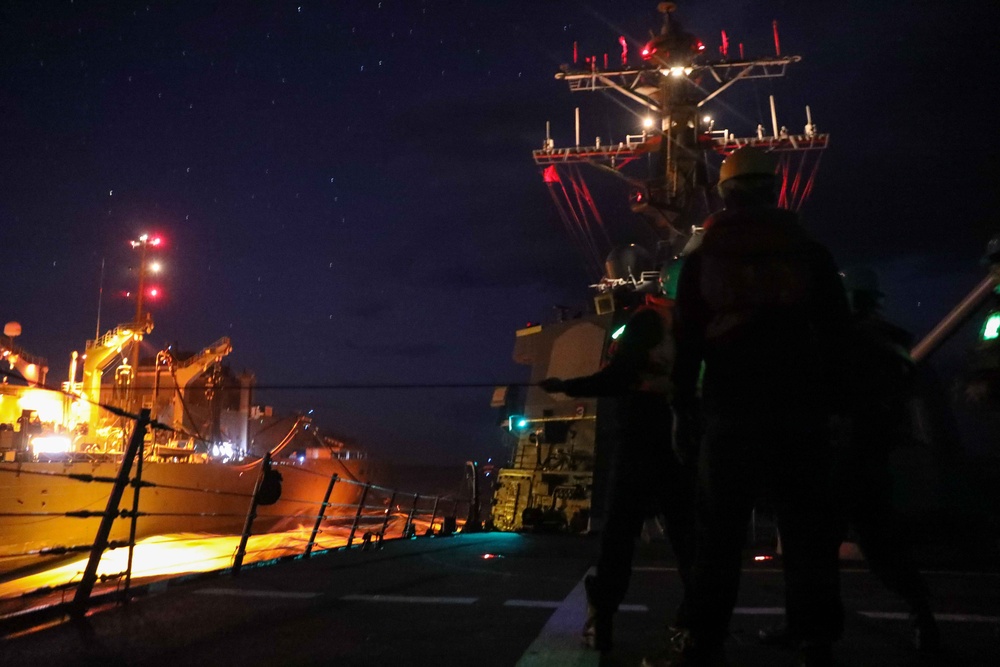 USS Ross replenishes at sea with USNS Supply