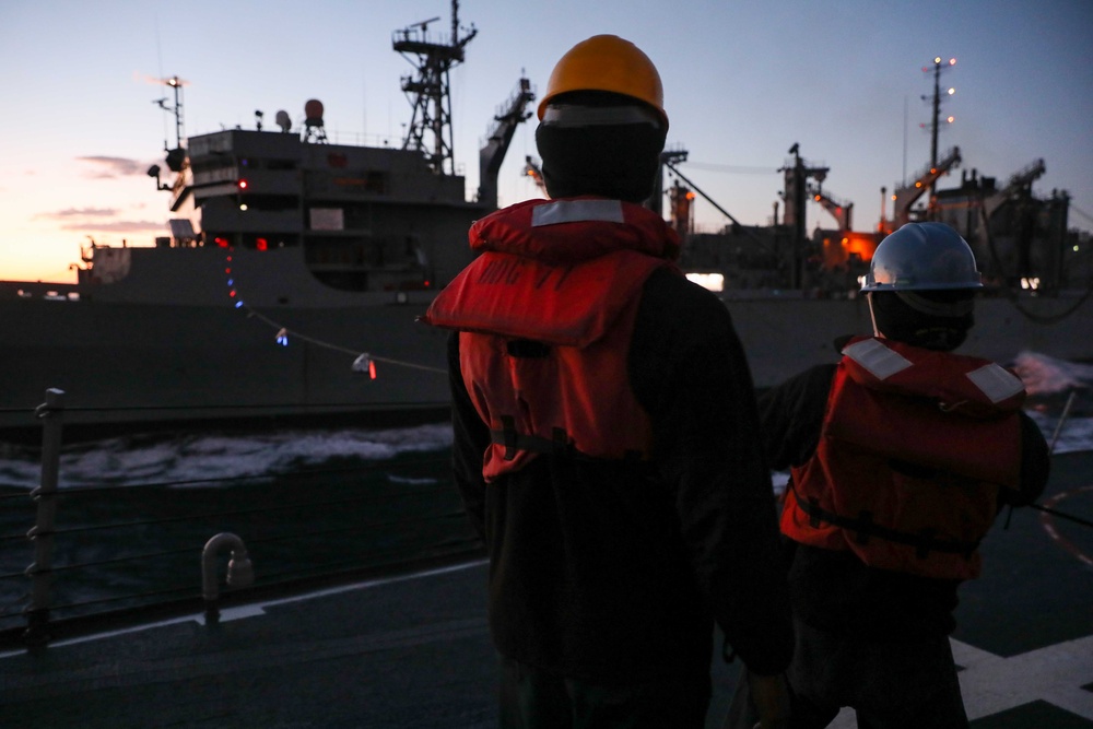 USS Ross replenishes at sea with USNS Supply