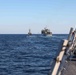 USS Ross replenishes at sea with USNS Supply