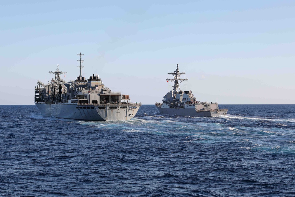 USS Ross replenishes at sea with USNS Supply