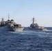 USS Ross replenishes at sea with USNS Supply