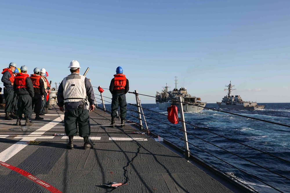 USS Ross replenishes at sea with USNS Supply