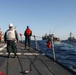 USS Ross replenishes at sea with USNS Supply