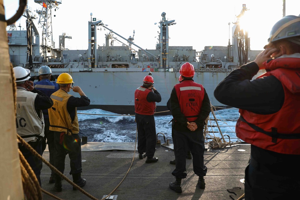 USS Ross replenishes at sea with USNS Supply