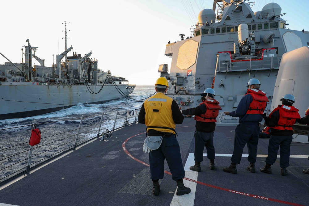 USS Ross replenishes at sea with USNS Supply