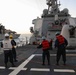 USS Ross replenishes at sea with USNS Supply