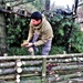 Building improvised shelters for Fort McCoy's Cold-Weather Operations Course