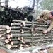 Building improvised shelters for Fort McCoy's Cold-Weather Operations Course