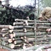 Building improvised shelters for Fort McCoy's Cold-Weather Operations Course