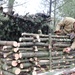 Building improvised shelters for Fort McCoy's Cold-Weather Operations Course